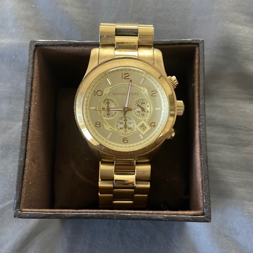 Gold Michael Kors watch will fit a small wrist